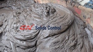 solids discharge from centrifuge